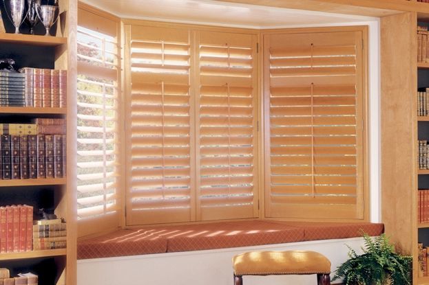 Window Treatments for Bay Windows: Heritance® hardwood shutters